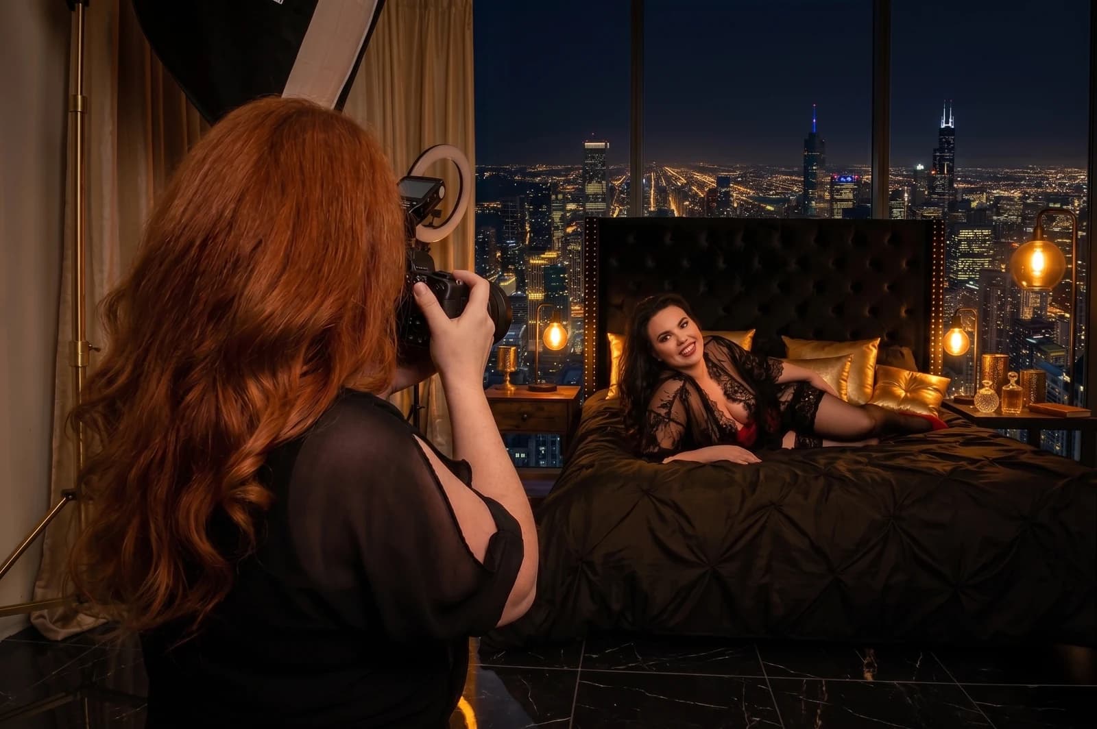 Casey Quist photographing a client on her cityscape set inside her custom Concord, California boudoir studio